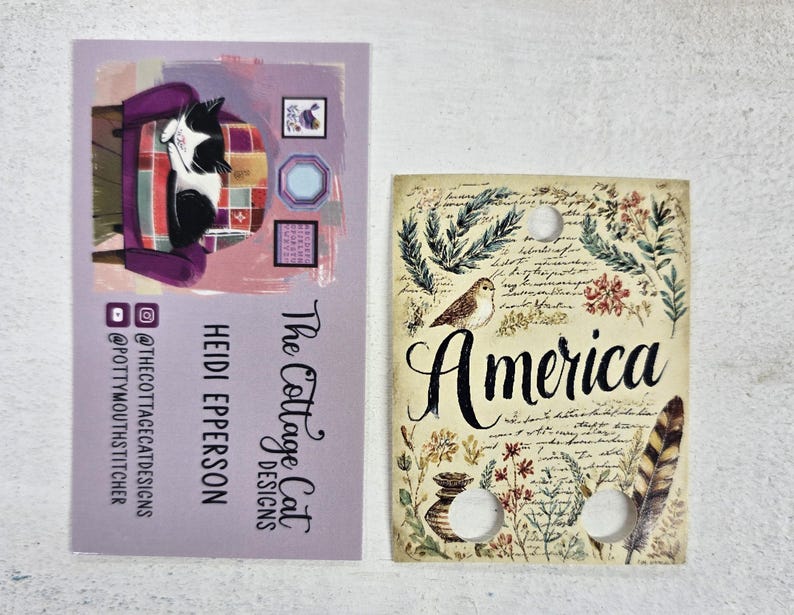The Cottage Cat Designs - Cartoon George Patriotic Floss Drops - Nashville Needlework Market 2026