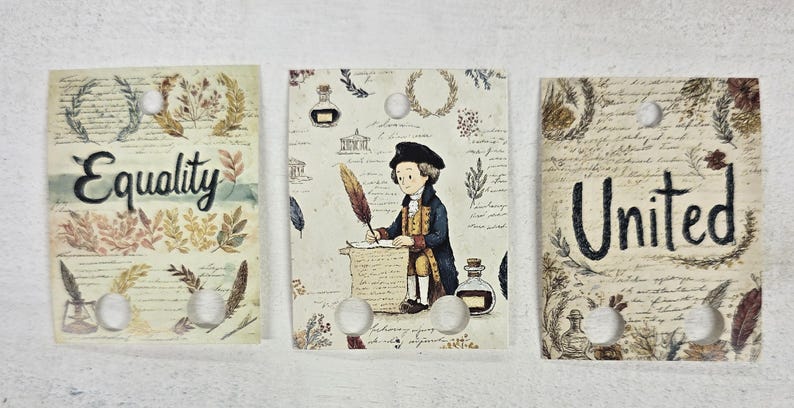 The Cottage Cat Designs - Cartoon George Patriotic Floss Drops - Nashville Needlework Market 2026