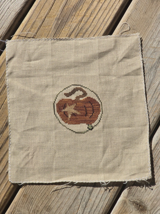 Pumpkin with Star - Completed Cross Stitch