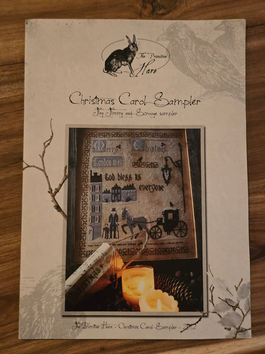 The Primitive Hare - Christmas Carol Sampler - Tiny Timmy and Scrooge Sampler - Cross Stitch Kit