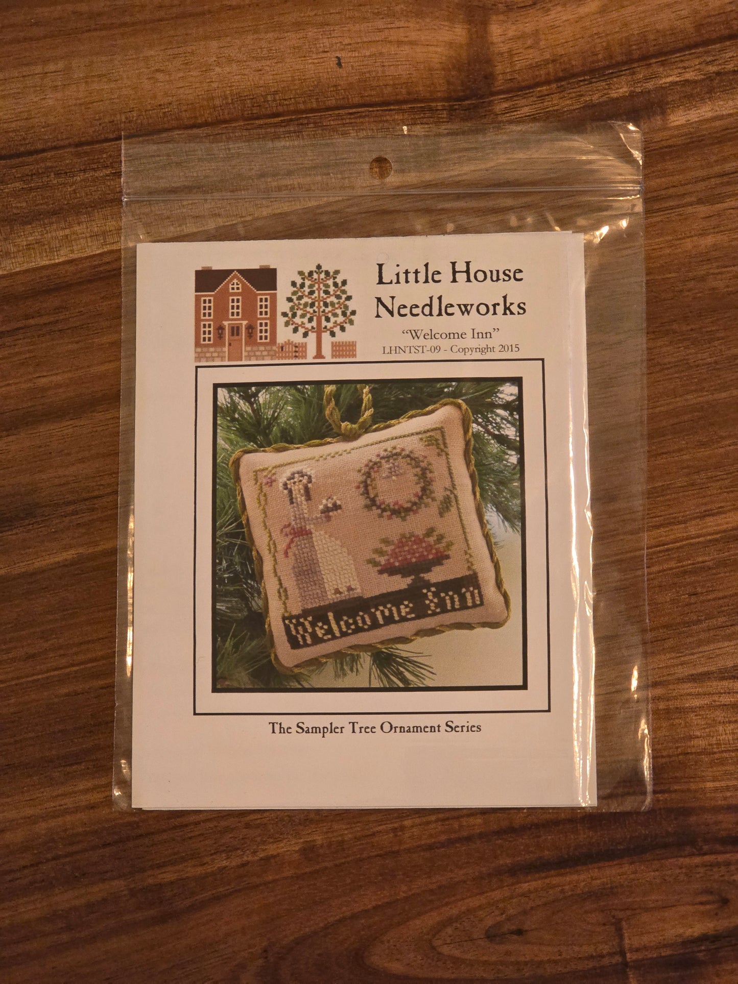 Little House Needleworks - The Sampler Tree Ornament Series - Welcome Inn - LHNTST-09 - Cross Stitch Pattern