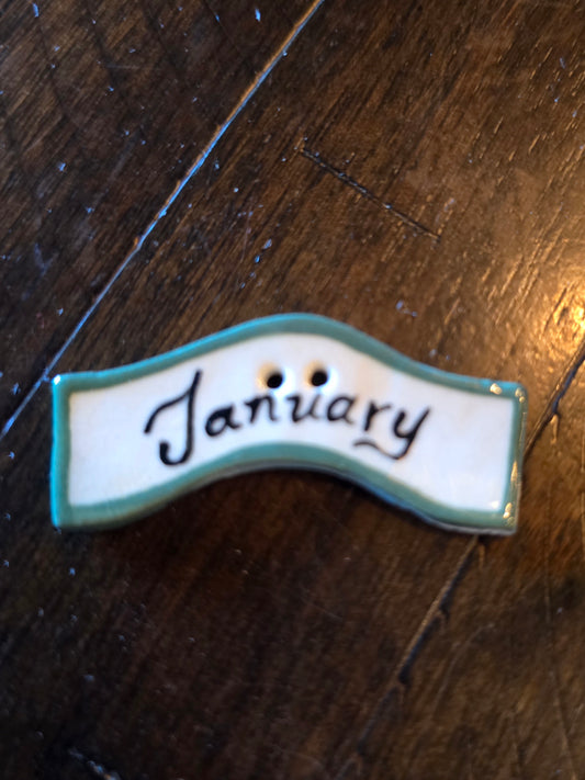 Albe Creation's, Inc. - January Ceramic Button