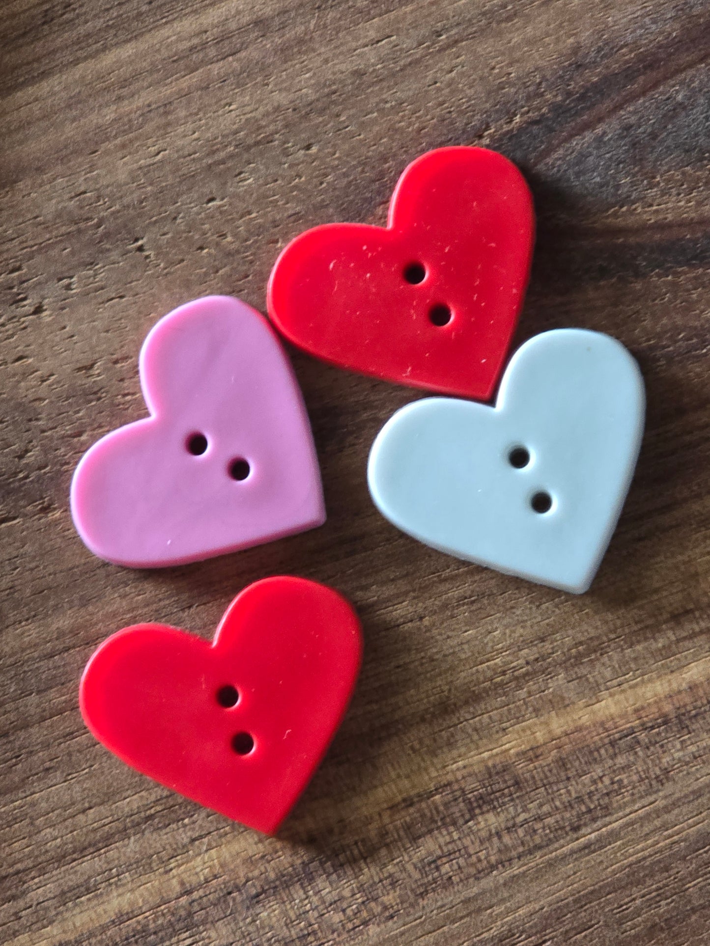 4 Plastic Heart Buttons