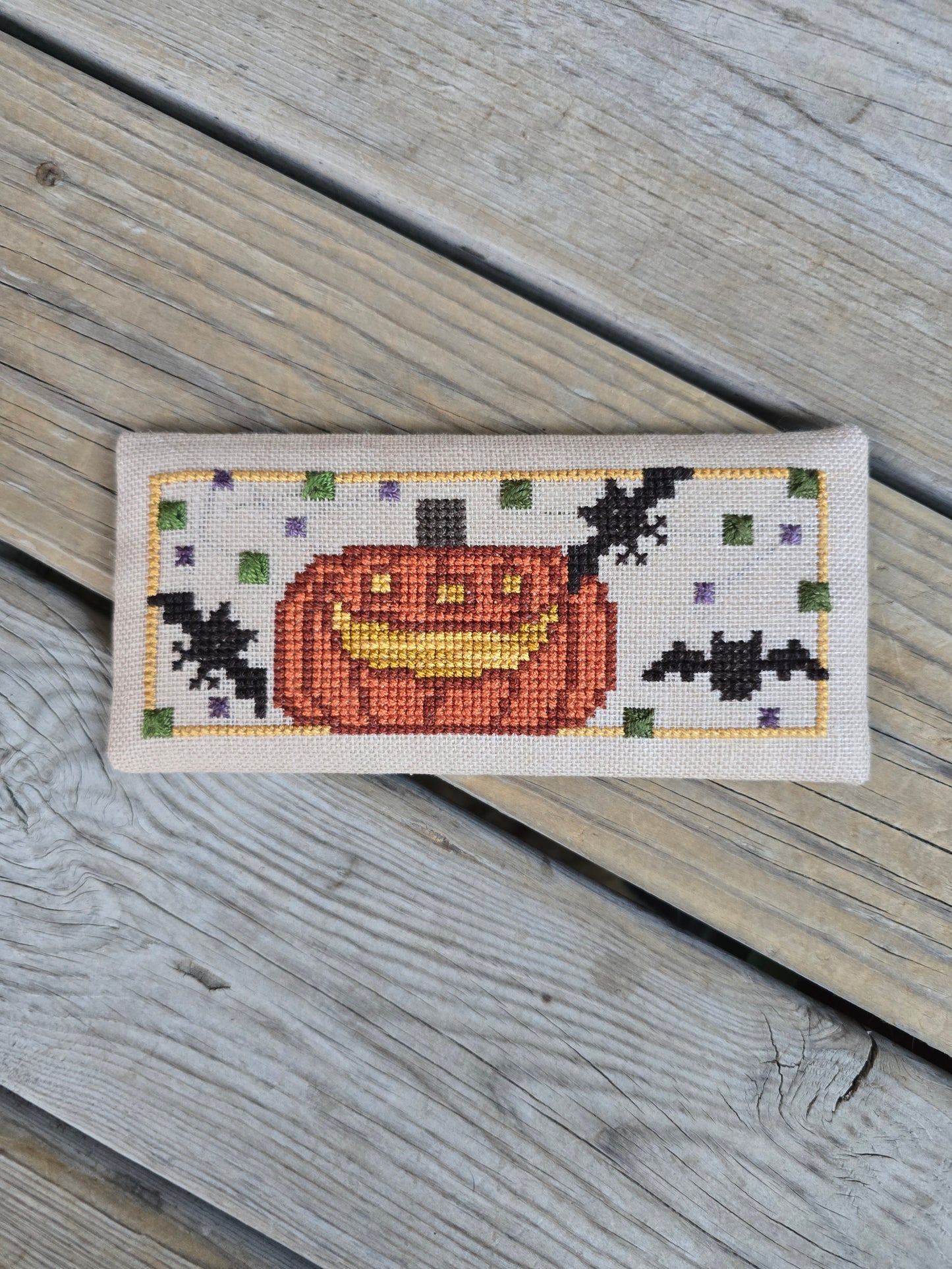 Jack O' Lantern and Bat - Completed Cross Stitch
